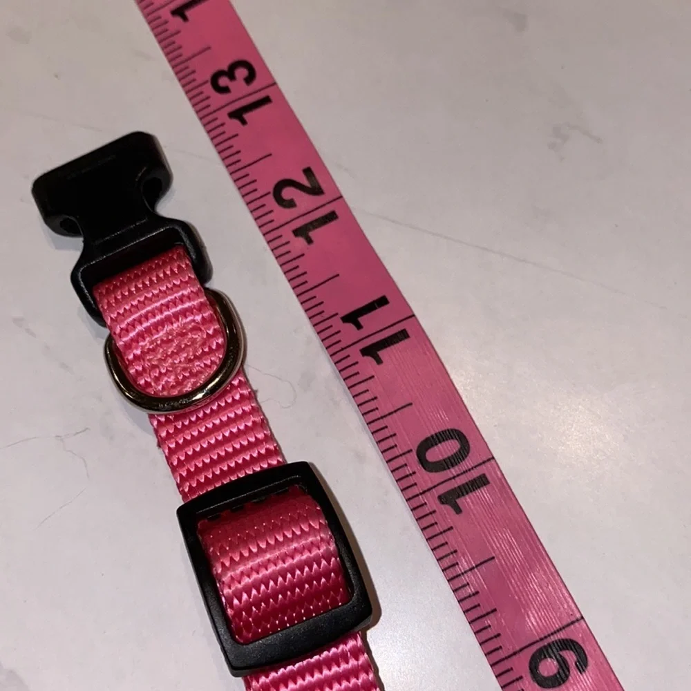 Pink pet collar, adjustable sizing, bright pink, black closure, .5” wide dog cat